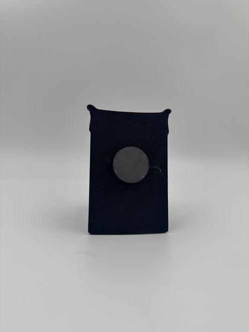 Back view of a Tibetan door curtain inspired fridge magnet with round magnet