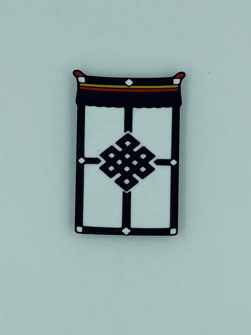 Front view of a Tibetan door curtain inspired fridge magnet